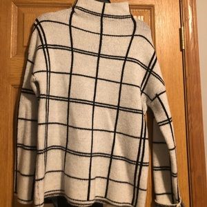 Black and white lined cowl neck sweater